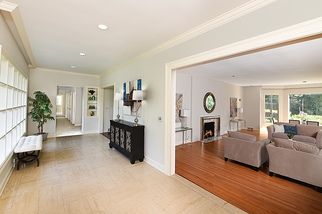 115 Woodley Road Winnetka, IL 60093 - Photo 4 of 41 a living room with furniture and a fireplace