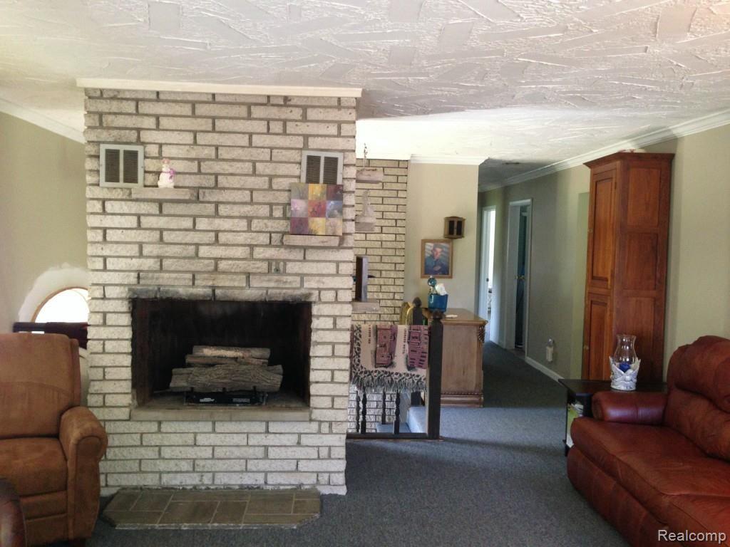 1731 West Leonard Road Leonard, MI 48367 - Photo 43 of 78 Living Room w/fireplace