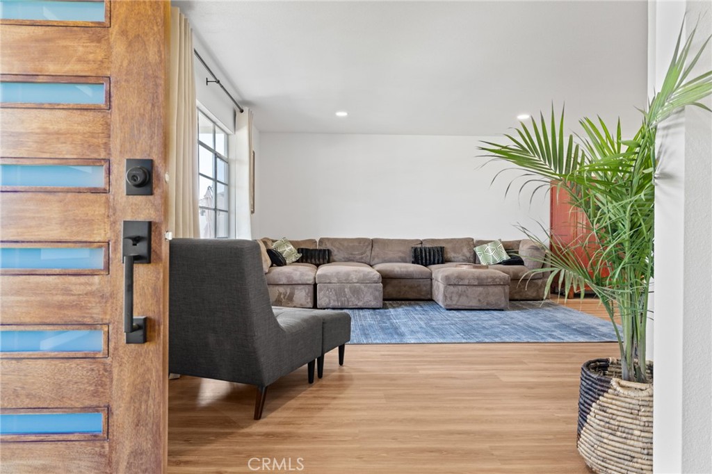 131 Gemini Street Lompoc, CA 93436 - Photo 3 of 30 a living room with furniture and a potted plant