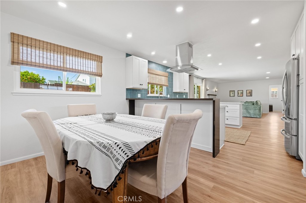 131 Gemini Street Lompoc, CA 93436 - Photo 8 of 30 a dining room with furniture and wooden floor