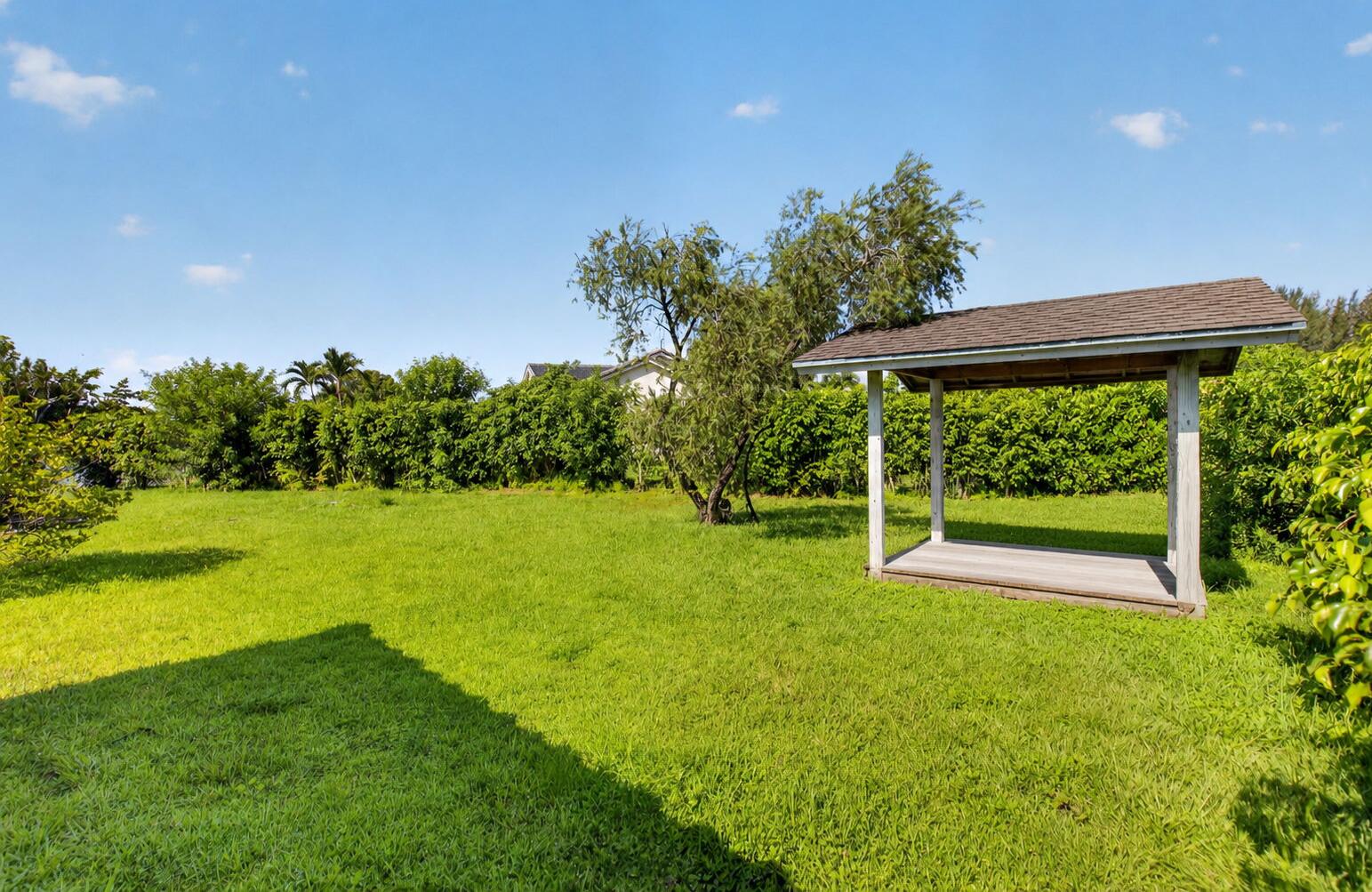 11845 Island Lakes Lane Boca Raton, FL 33498 - Photo 27 of 78 Side yard gazebo
