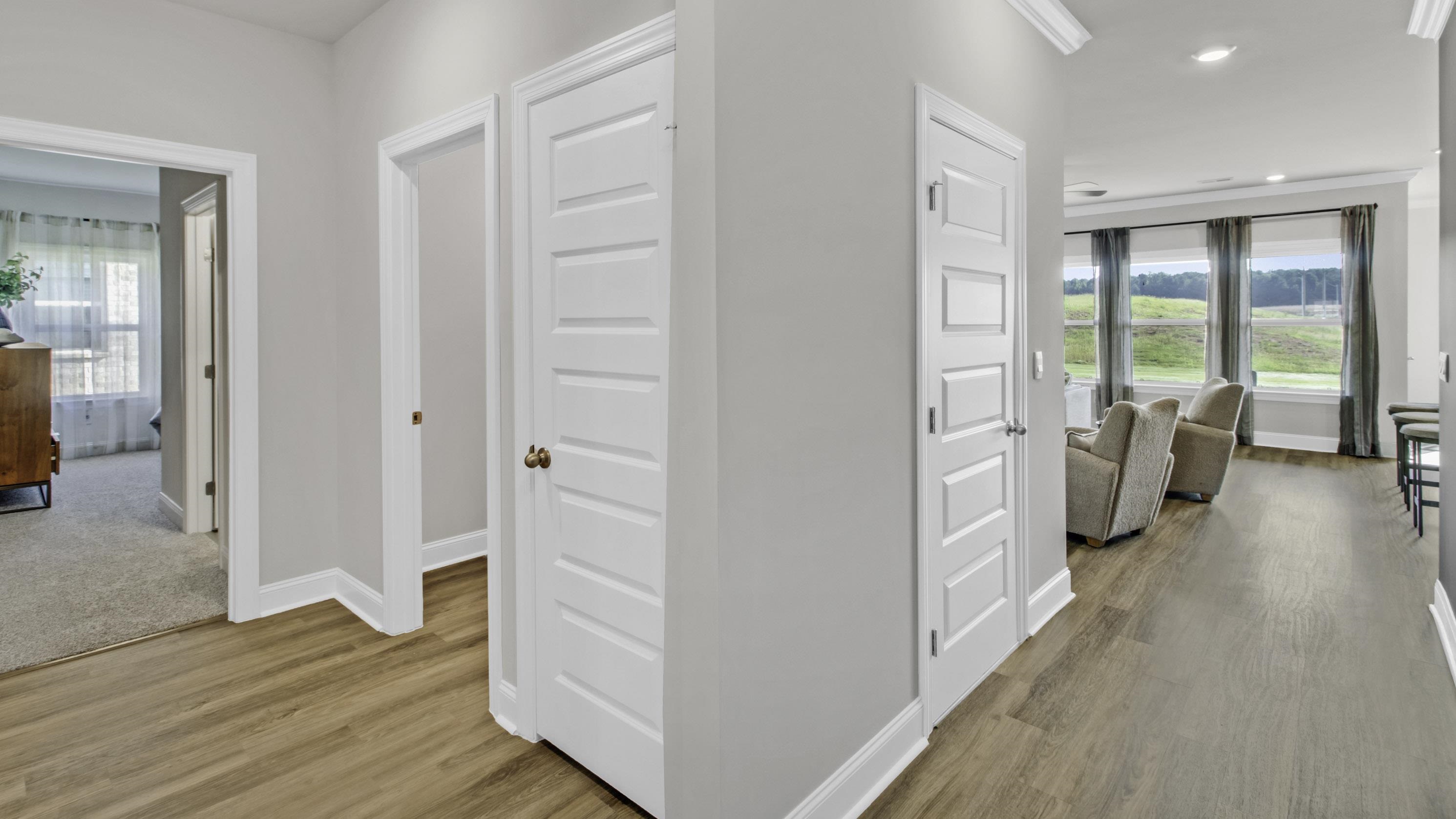990 Mewborn Farm Road Oakland, TN 38060 - Photo 27 of 40 Hallway with plenty of natural light, light wood-style floors, and recessed lighting