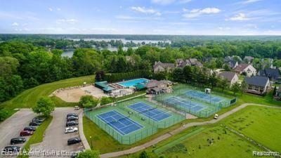 4233 Augusta Court Howell, MI 48843 - Photo 45 of 49 Tennis & Swimming at the Club!
