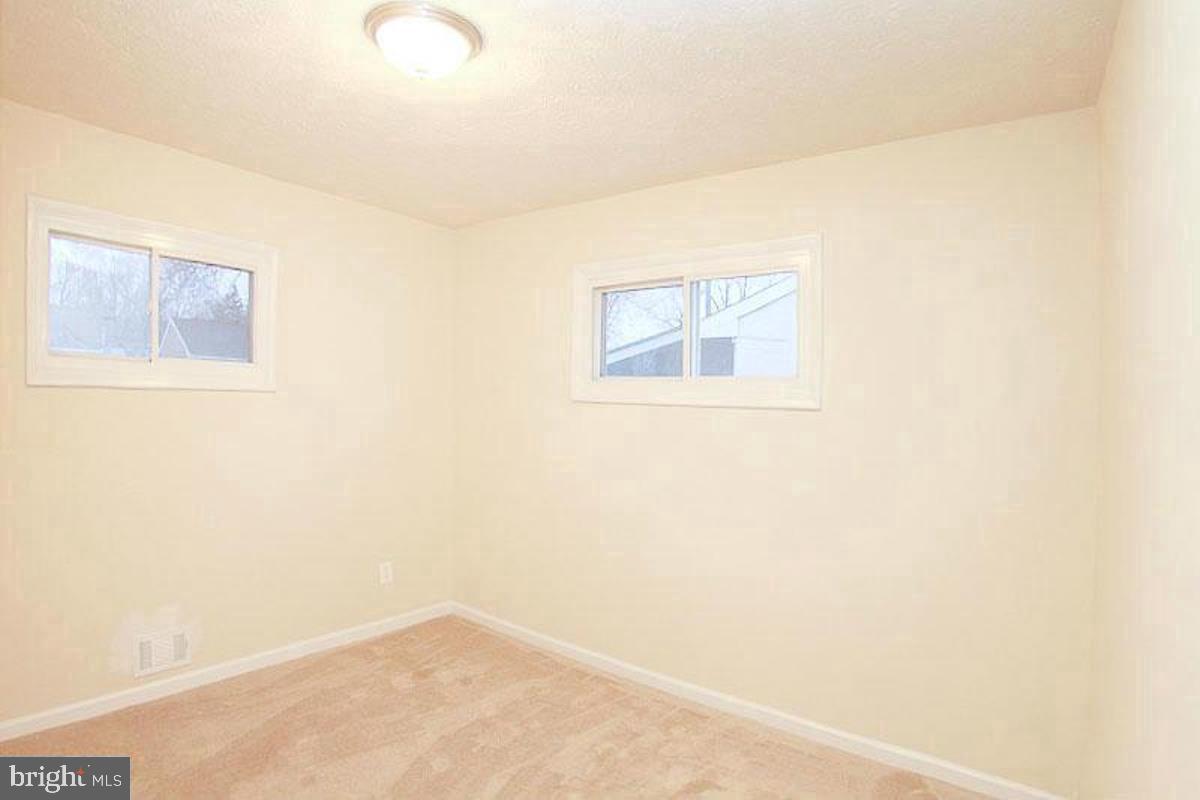 14 Cedar Hill Road Brooklyn, MD 21225 - Photo 3 of 10 a view of a small space with a window