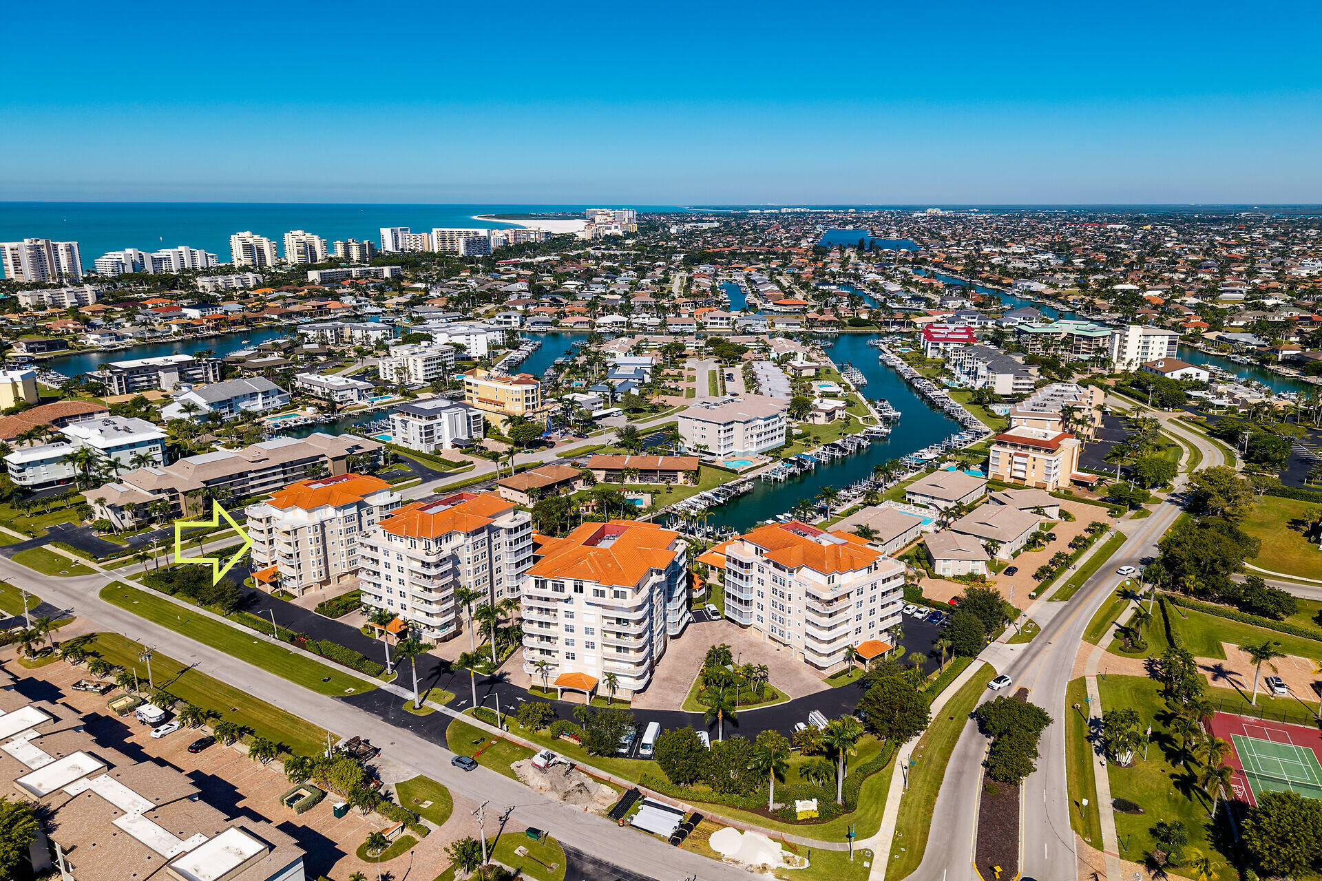 1111 Swallow Avenue, Unit 1401 Marco Island, FL 34145 - Photo 4 of 36 an aerial view of a city