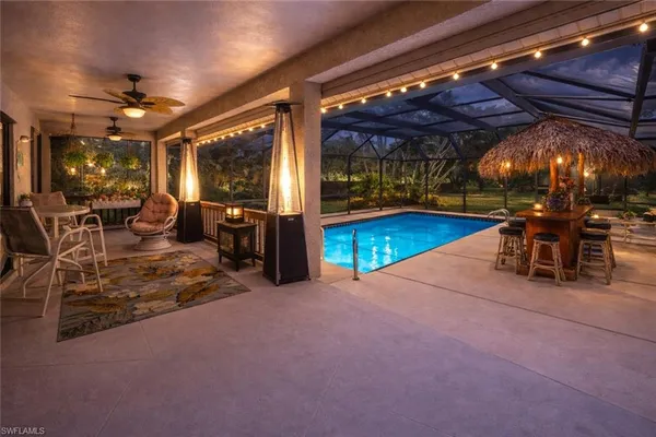 $990,000 | 116 Sharwood Drive, Naples, FL 34110