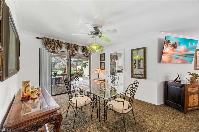 a kitchen with stainless steel appliances granite countertop a sink a stove and a wooden floors