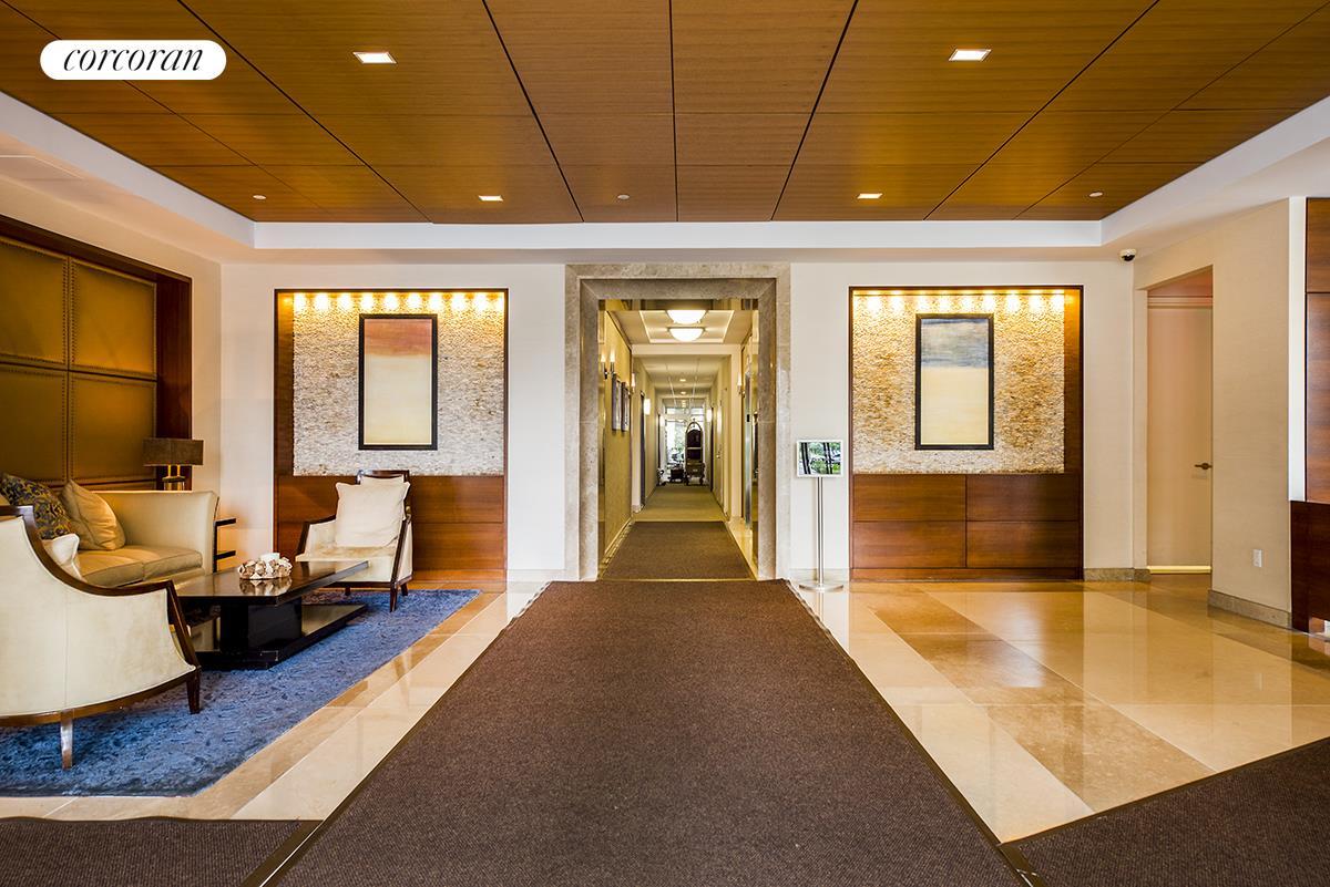 415 Main Street, Unit 2F Manhattan, NY 10044 - Photo 17 of 18 a living room with furniture