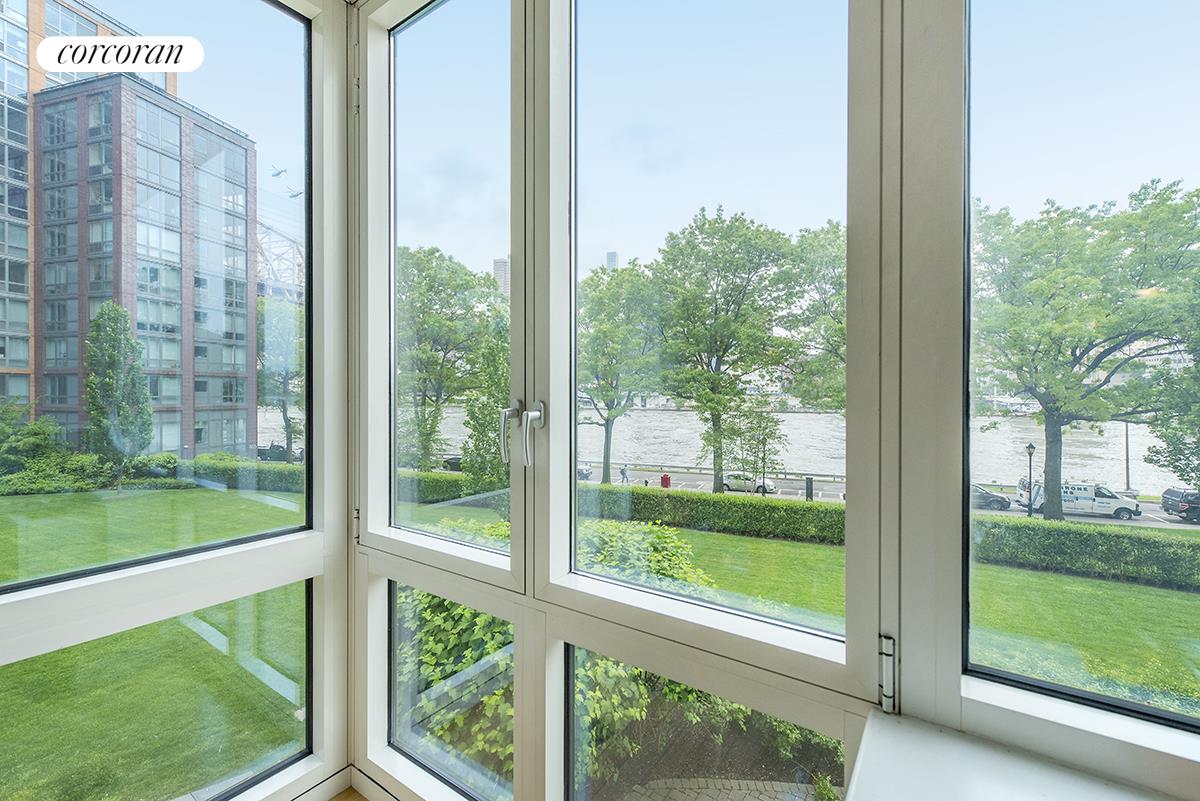 415 Main Street, Unit 2F Manhattan, NY 10044 - Photo 7 of 18 a view of a city from a balcony