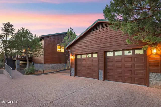 a front view of a house with a garage