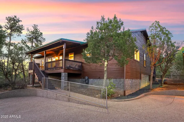 a view of house with a outdoor space and shower