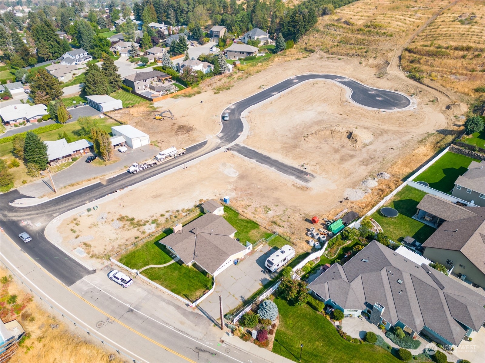 124 Freedom Hills Cashmere, WA 98815 - Photo 2 of 27 an aerial view of a house with a yard and lake view