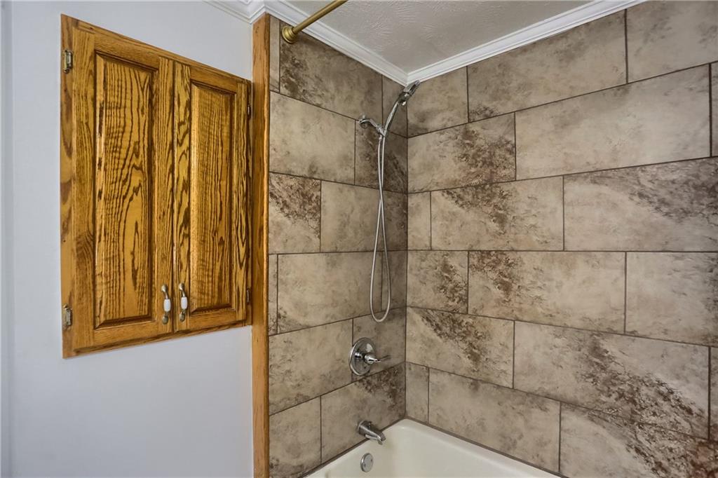 155 Dutchtown Road Butler, PA 16002 - Photo 14 of 34 a bathroom with a shower