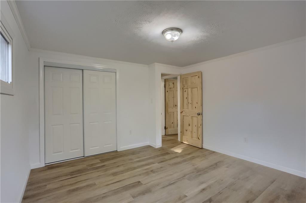 155 Dutchtown Road Butler, PA 16002 - Photo 16 of 34 a view of an empty room and wooden floor