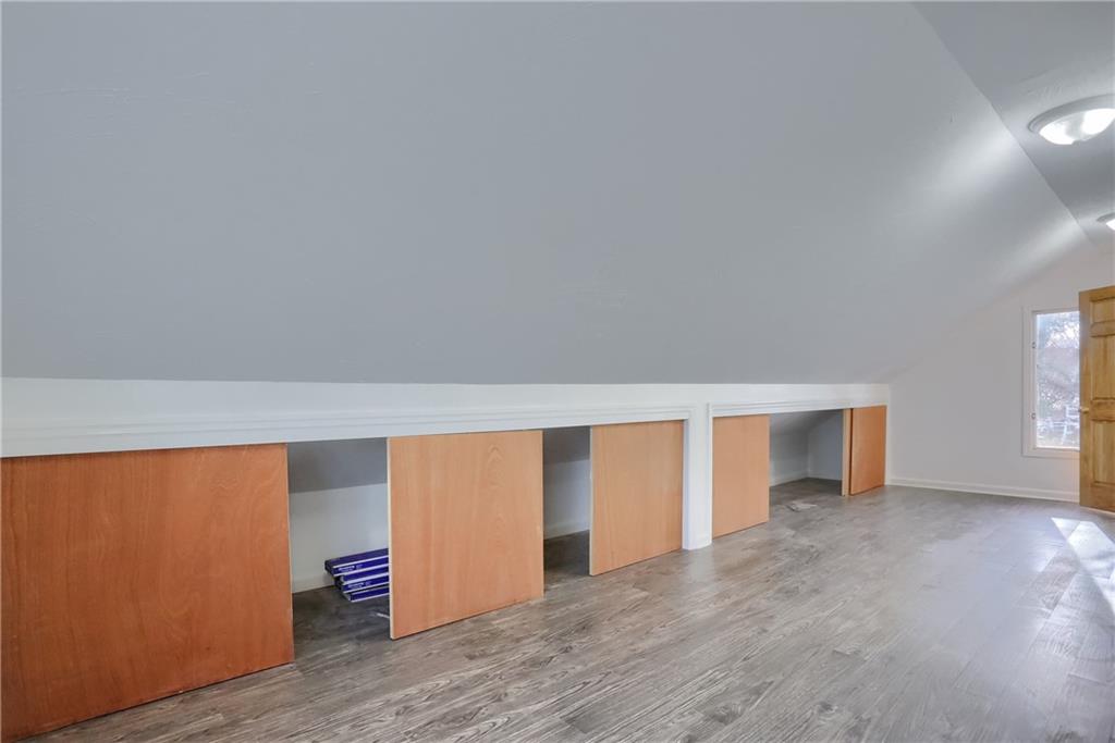 155 Dutchtown Road Butler, PA 16002 - Photo 22 of 34 an empty room with wooden floor and windows