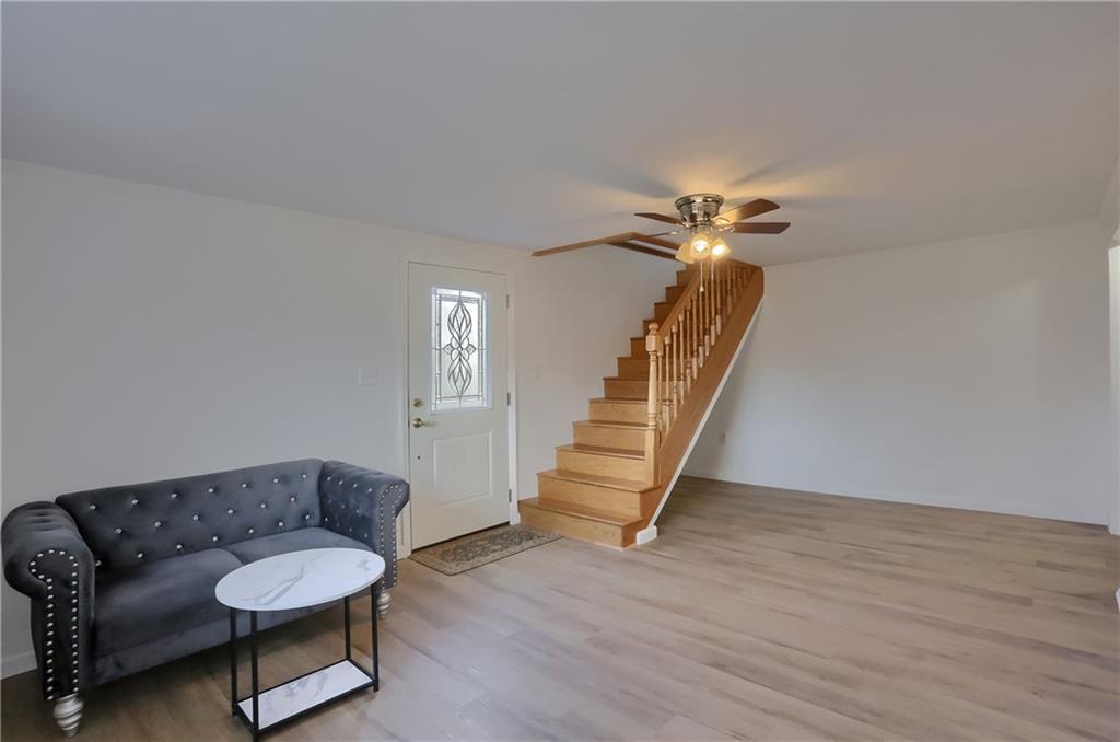 155 Dutchtown Road Butler, PA 16002 - Photo 3 of 34 a living room with furniture and a potted plant