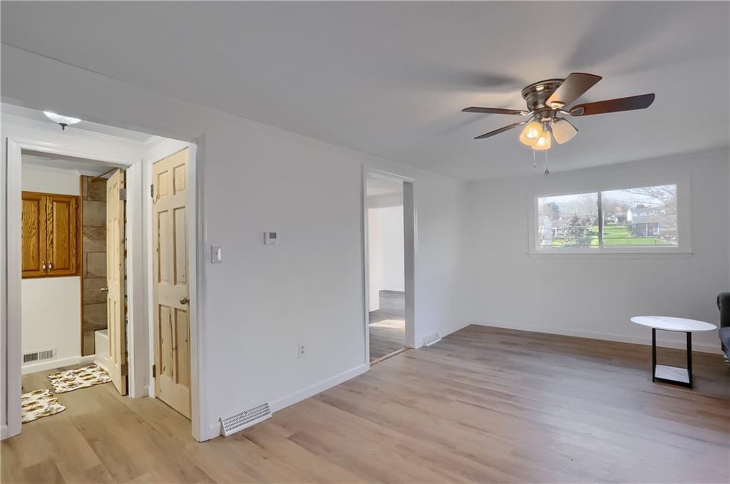 155 Dutchtown Road Butler, PA 16002 - Photo 5 of 34 wooden floor in an empty room with a window