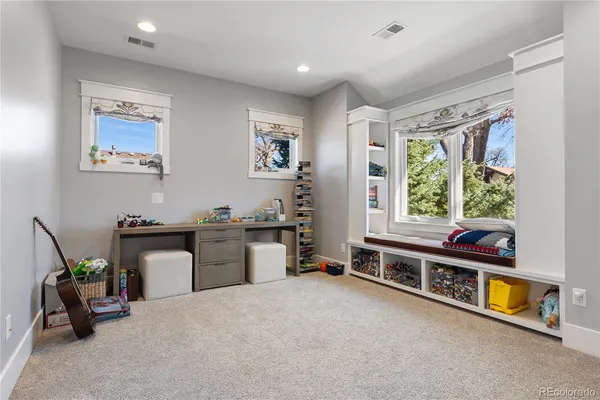 a view of a livingroom with furniture window and workspace