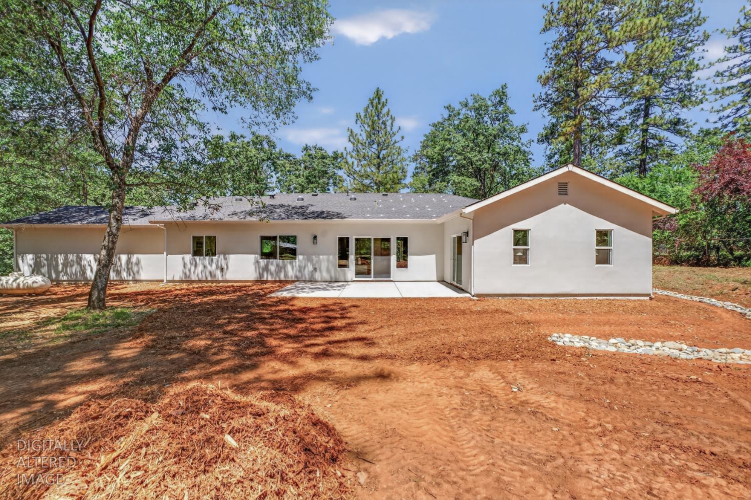 280 Jan Road Grass Valley, CA 95945 - Photo 35 of 66 a front view of house with yard and trees in the background