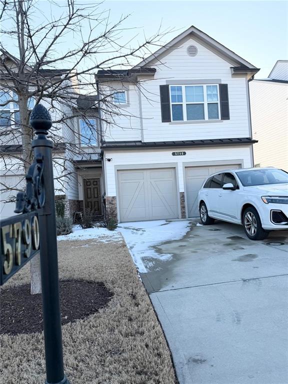 5790 Flint Lane Cumming, GA 30028 - Photo 2 of 40 a car parked in front of a house