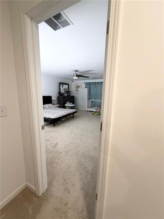 5790 Flint Lane Cumming, GA 30028 - Photo 23 of 40 a room with a bed and furniture