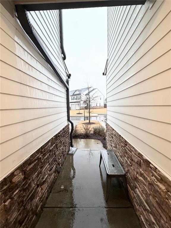 5790 Flint Lane Cumming, GA 30028 - Photo 29 of 40 a view of a balcony with two chairs
