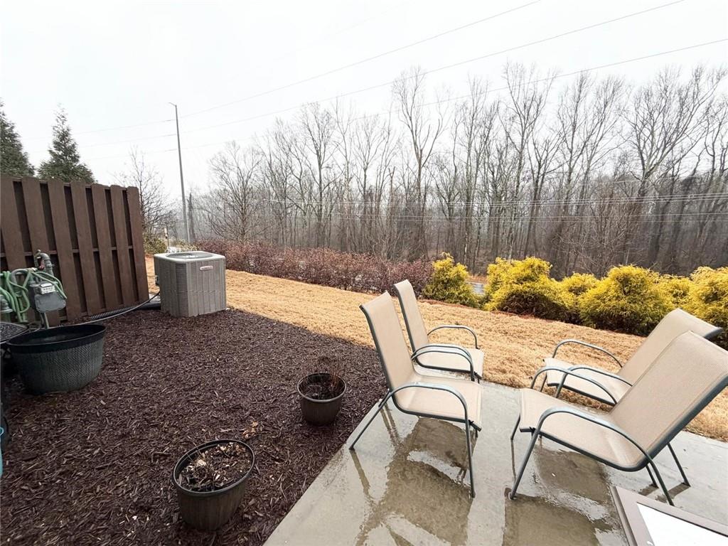 5790 Flint Lane Cumming, GA 30028 - Photo 38 of 40 a view of a backyard with furniture and grill