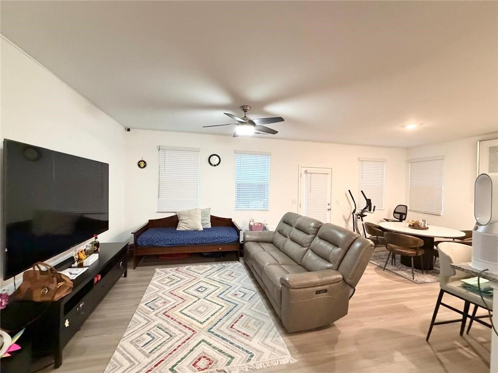 5790 Flint Lane Cumming, GA 30028 - Photo 5 of 40 a living room with furniture and a flat screen tv