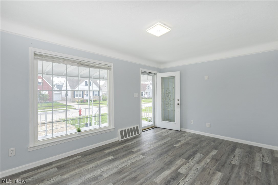 30025 Elgin Road Wickliffe, OH 44092 - Photo 3 of 41 Living room with LVT floors and loads of natural sunlight