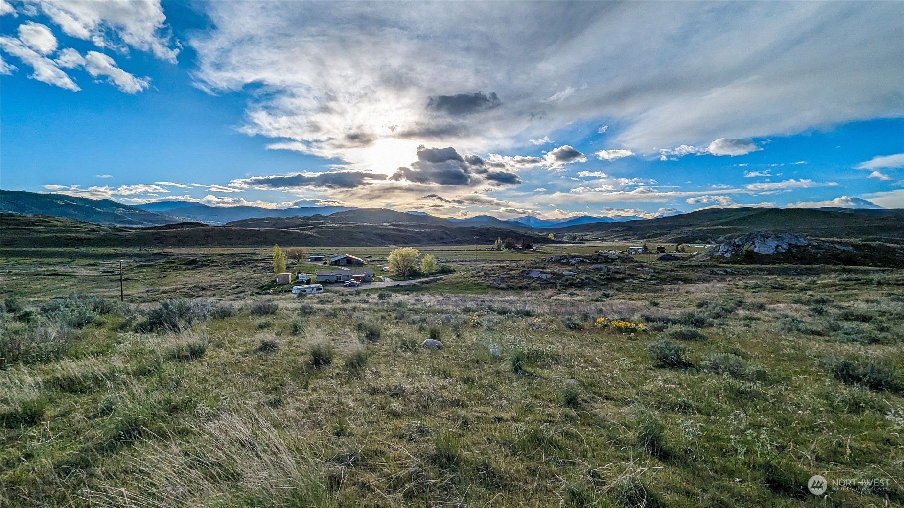 255 Riverside Cutoff Road Riverside, WA 98849 - Photo 1 of 40 a view of a big yard with lots of green space