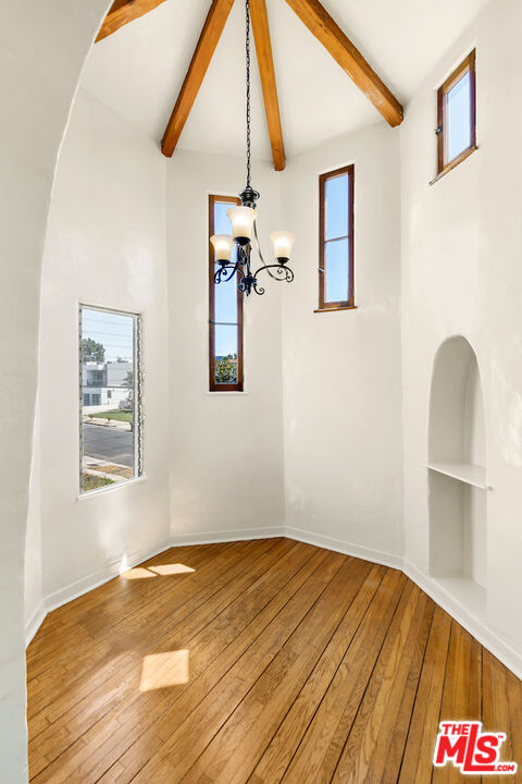8221 West 4th Street Los Angeles, CA 90048 - Photo 12 of 21 a view of a room with wooden floor and workspace