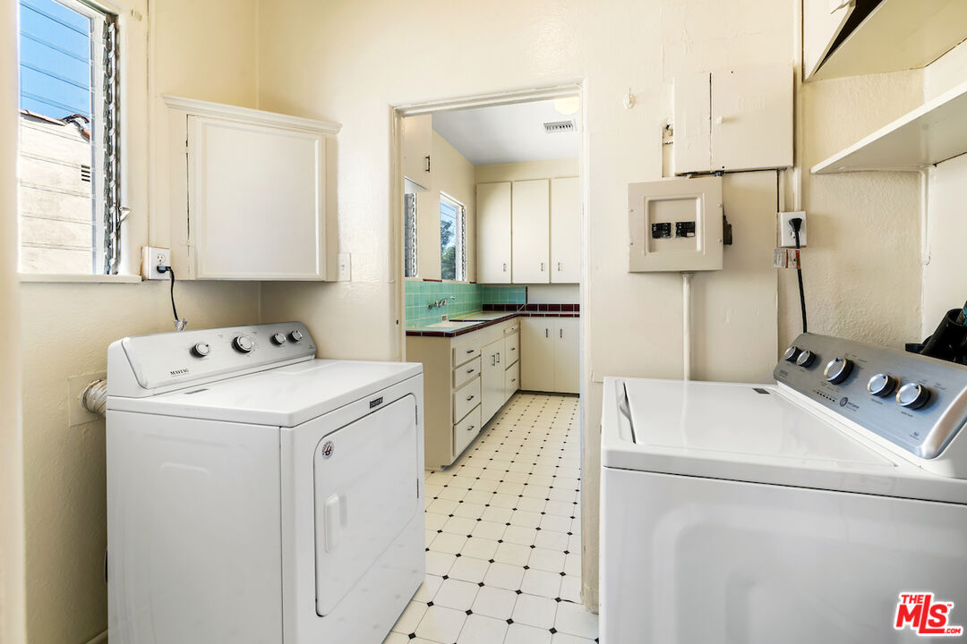 8221 West 4th Street Los Angeles, CA 90048 - Photo 14 of 21 a utility room with dryer and washer