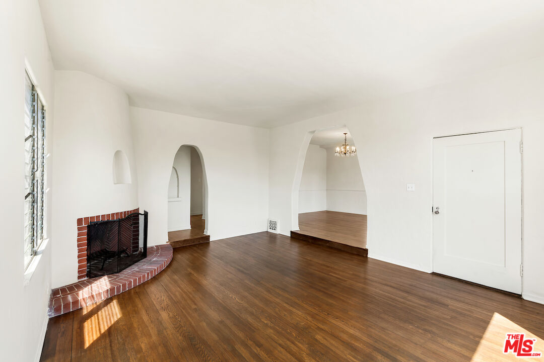 8221 West 4th Street Los Angeles, CA 90048 - Photo 5 of 21 a view of living room with furniture and a flat screen tv