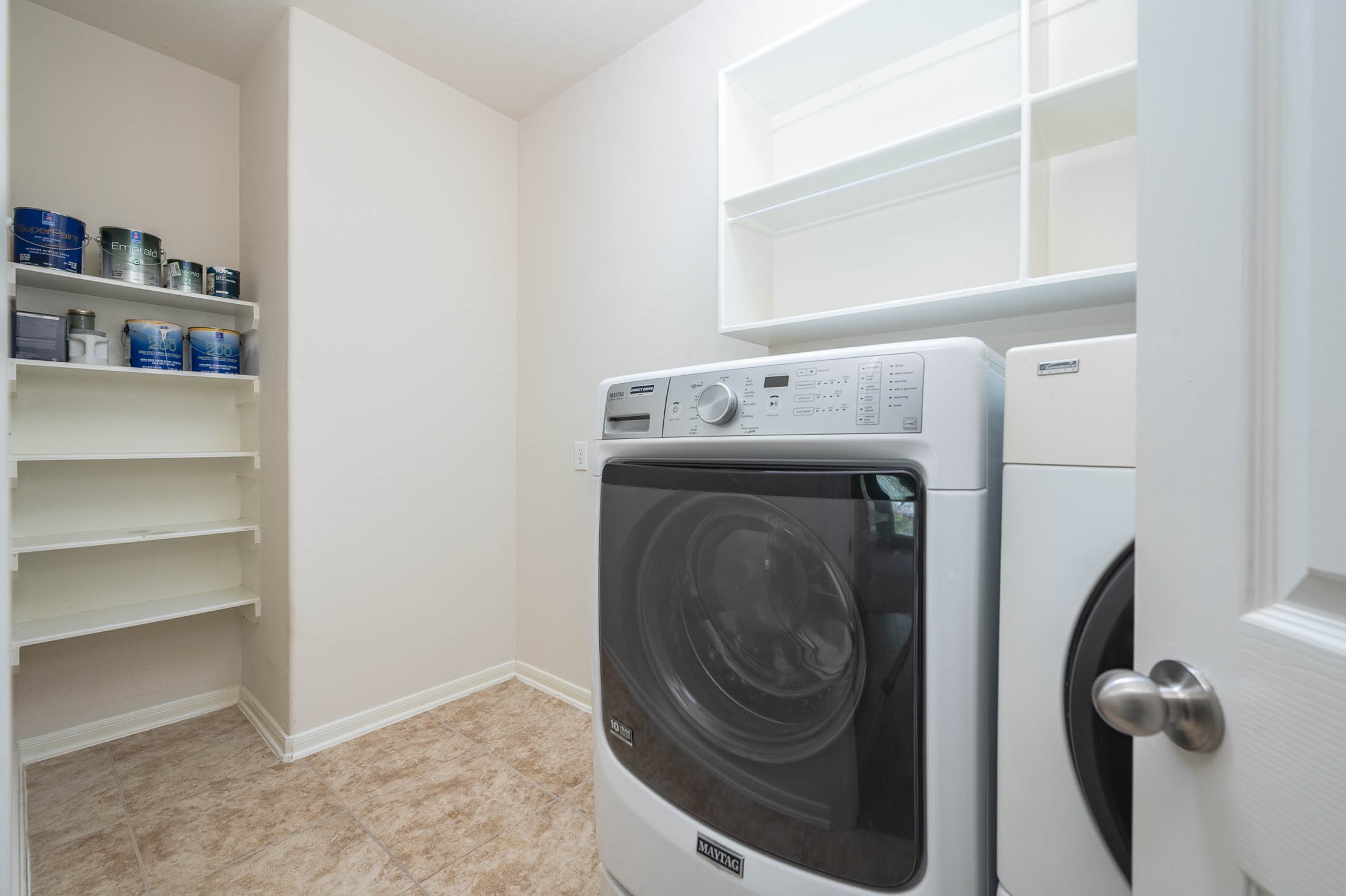 6411 Greencreek Meadows Lane Spring, TX 77379 - Photo 19 of 39 a utility room with dryer and washer