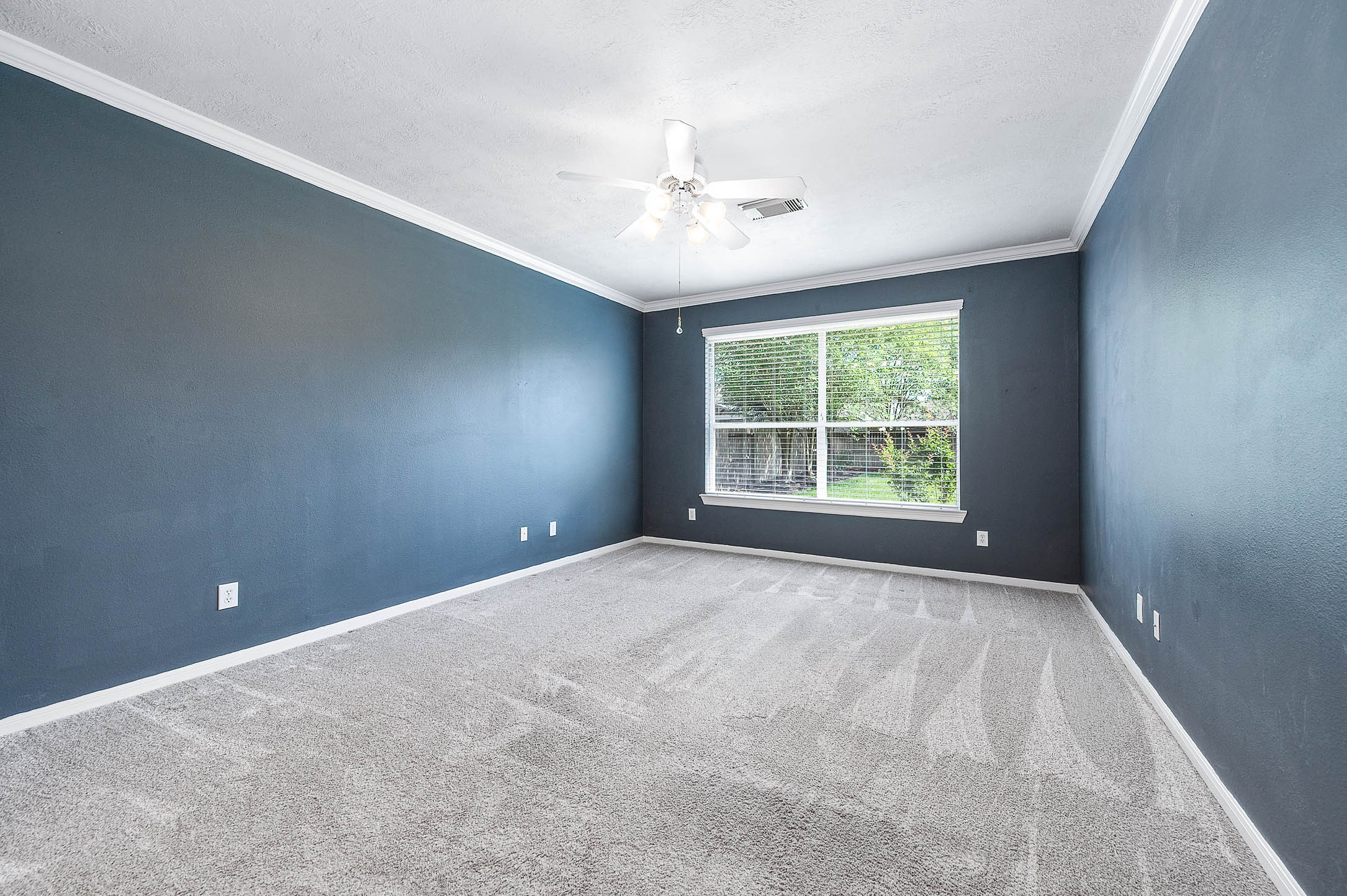 6411 Greencreek Meadows Lane Spring, TX 77379 - Photo 20 of 39 a view of an empty room with a window