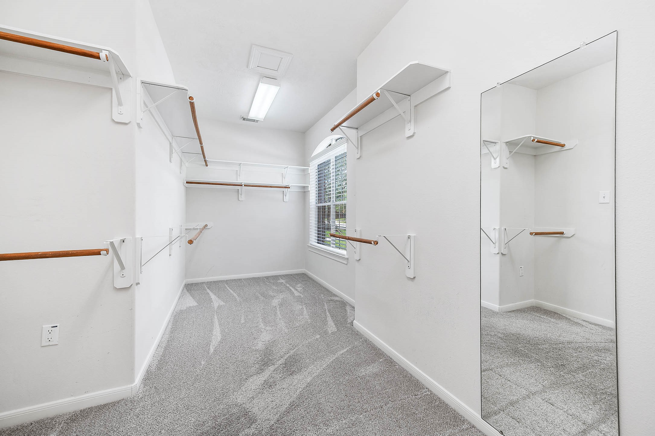 6411 Greencreek Meadows Lane Spring, TX 77379 - Photo 24 of 39 a view of a room that has a grey walls