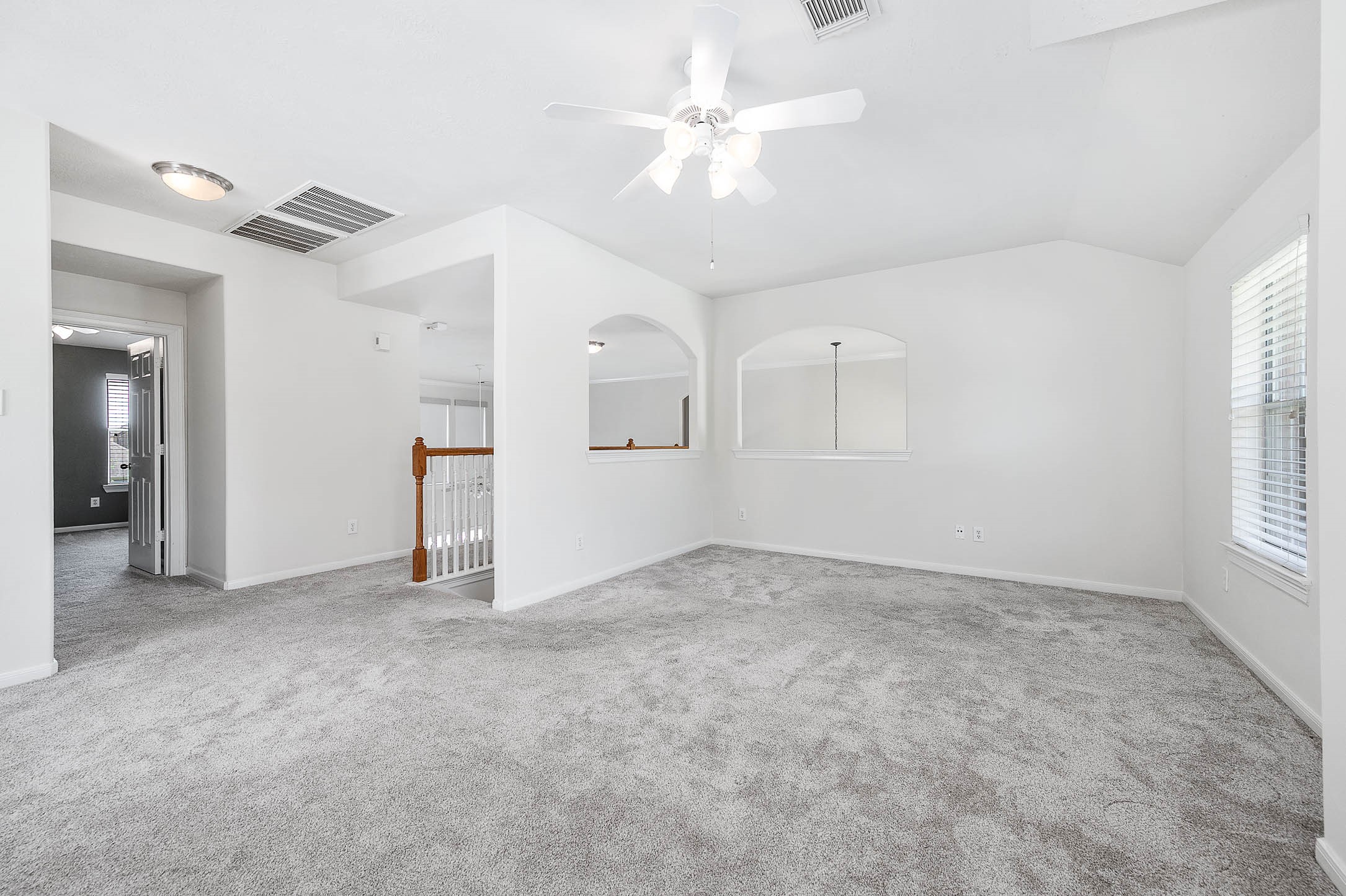 6411 Greencreek Meadows Lane Spring, TX 77379 - Photo 27 of 39 an empty room with fan and windows
