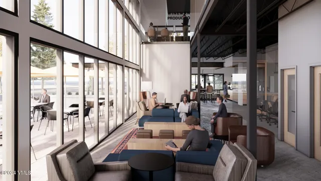 a living room with furniture a rug and white walls