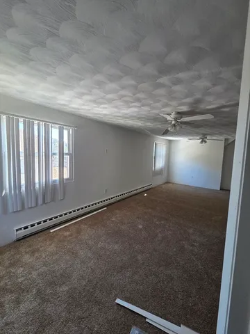 a bathroom with a sink a toilet and a tub