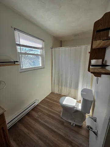 an empty room with a bench