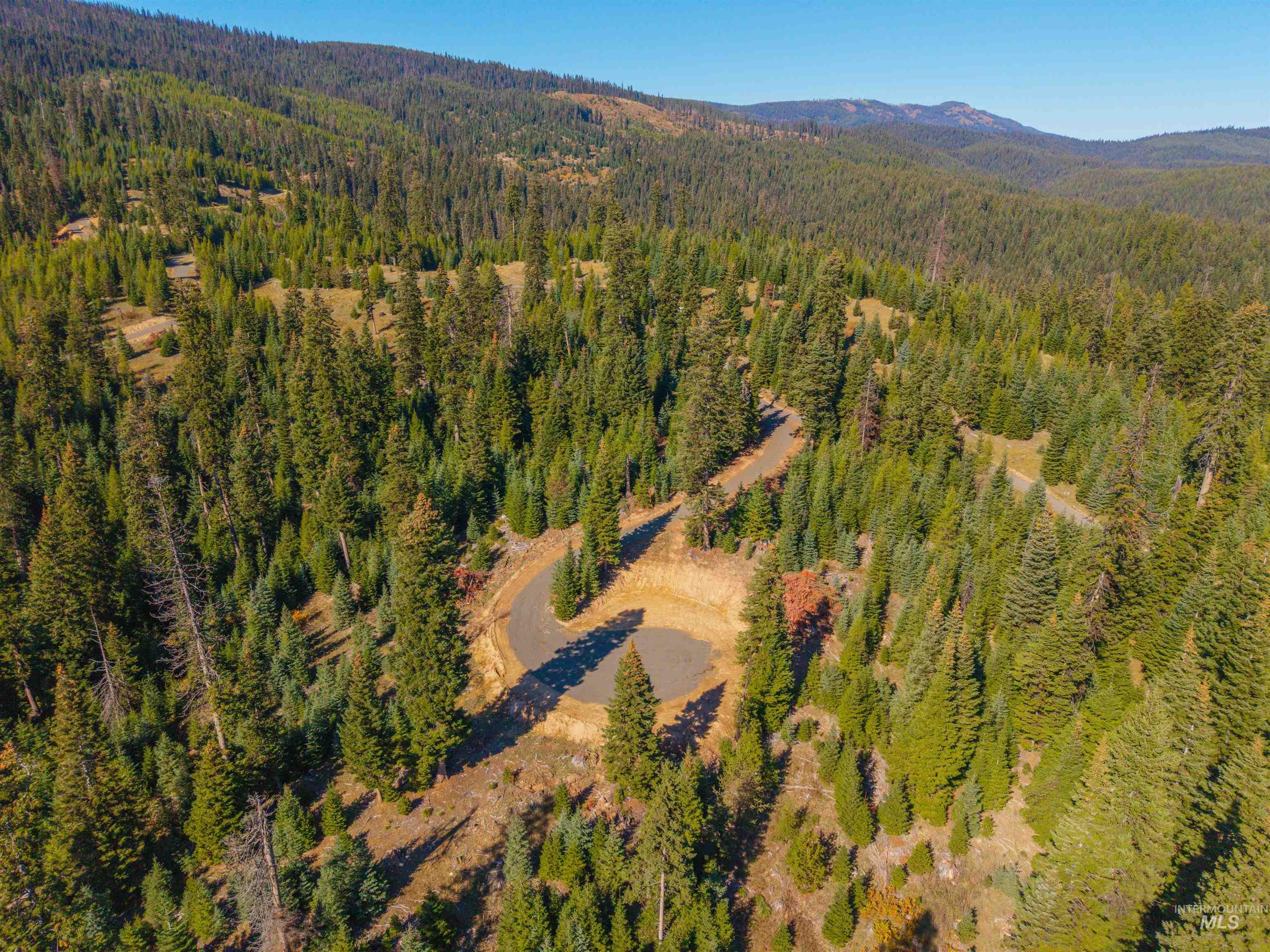 4 Tree Farm Trails Road Elk City, ID 83525 - Photo 15 of 17 View of property location featuring mountains and a heavily wooded area