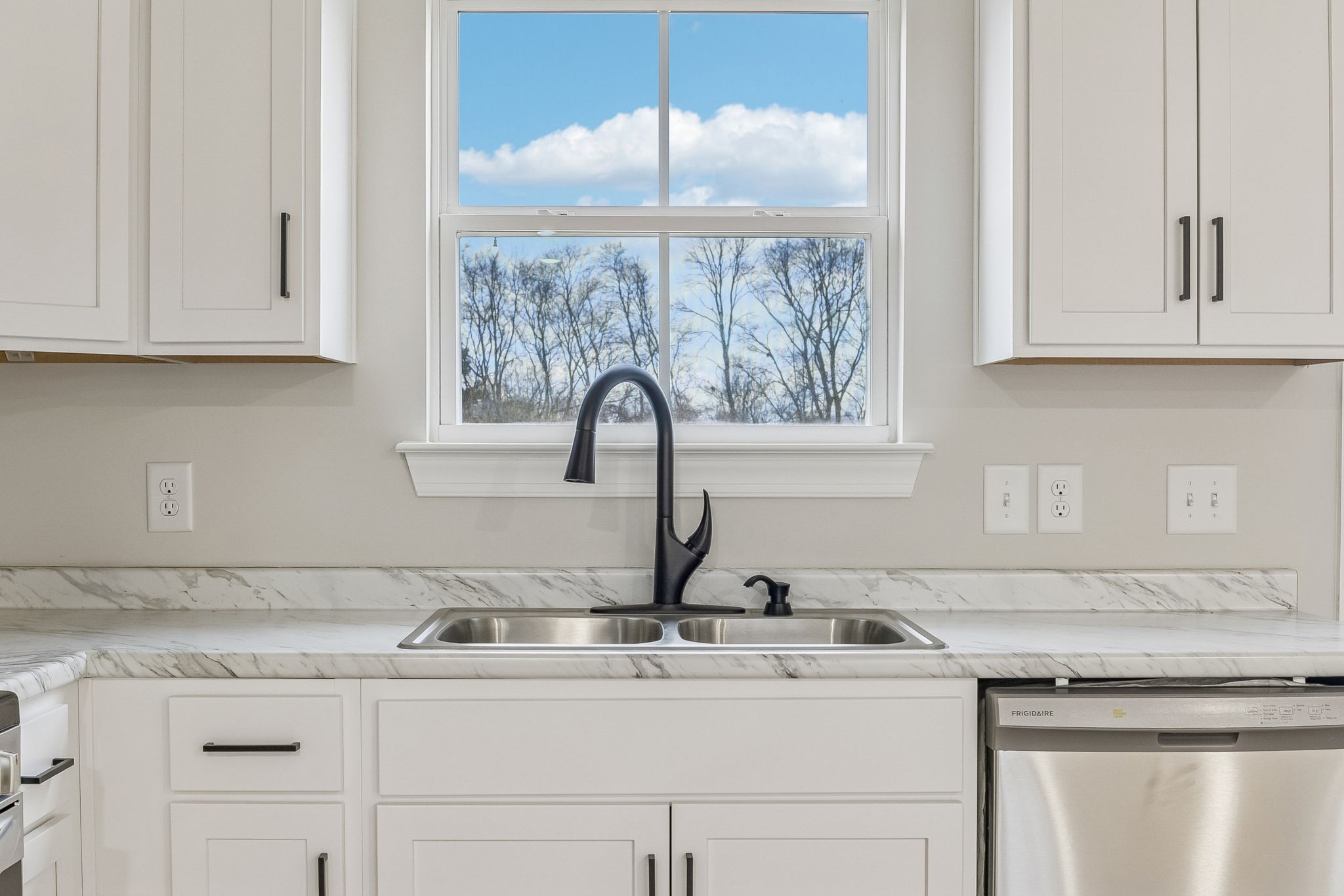 1073 Landing Lane Adams, TN 37010 - Photo 11 of 28 a kitchen with a sink and cabinets