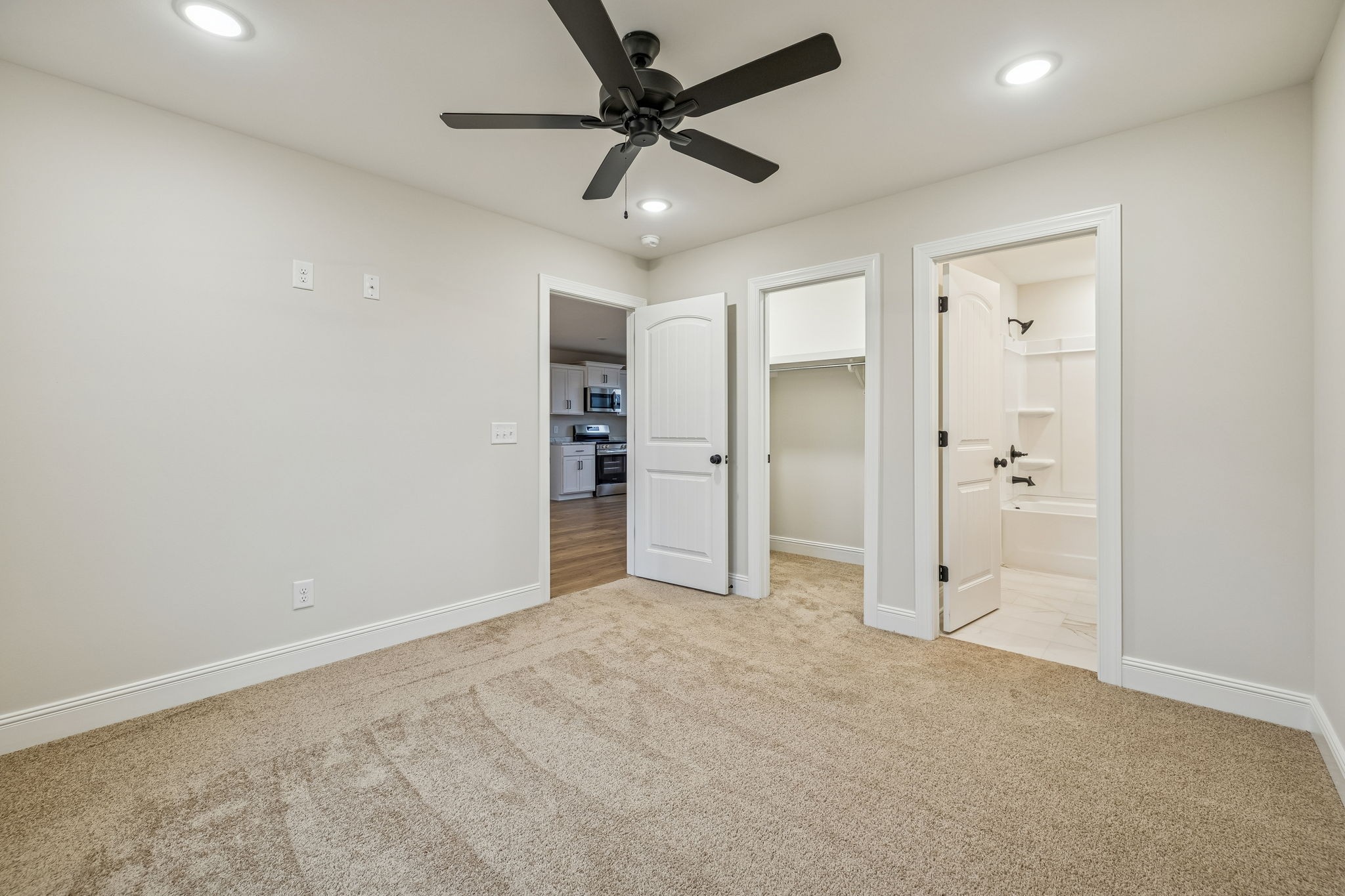 1073 Landing Lane Adams, TN 37010 - Photo 14 of 28 an empty room with closet and a ceiling fan