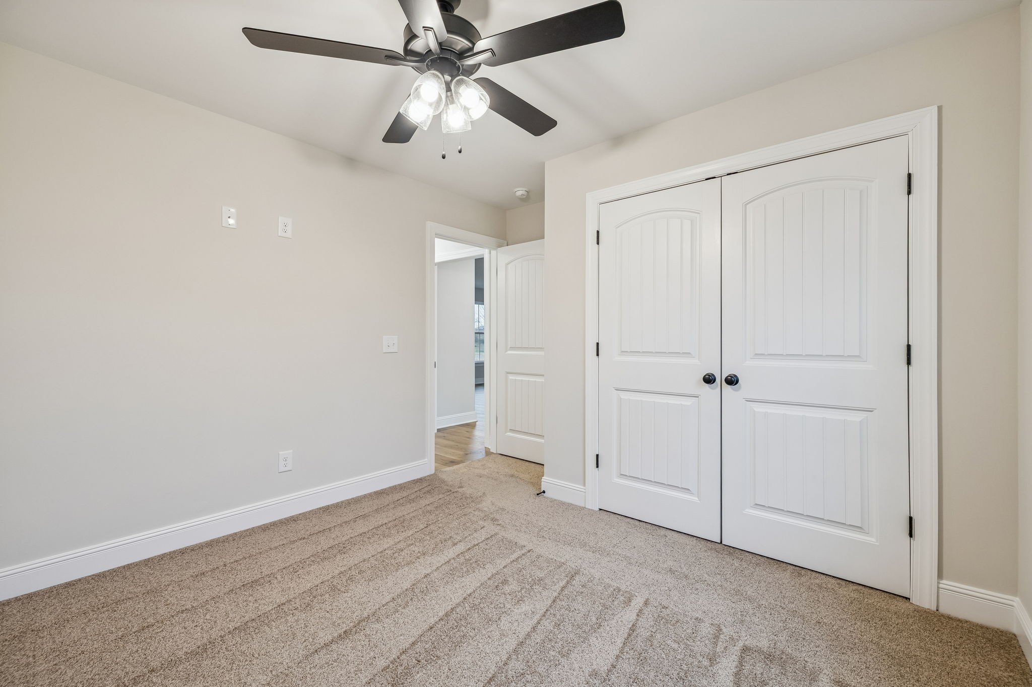 1073 Landing Lane Adams, TN 37010 - Photo 18 of 28 an empty room with fan and a ceiling fan