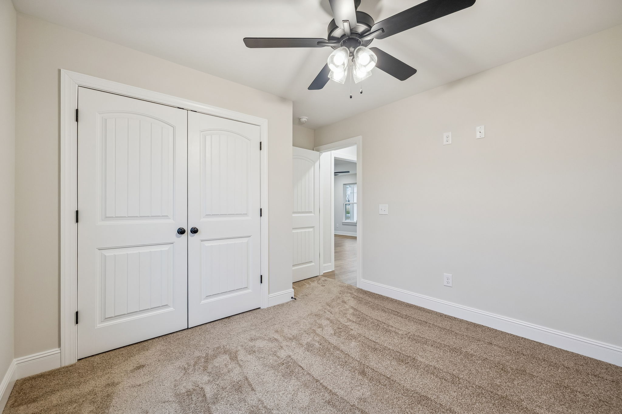 1073 Landing Lane Adams, TN 37010 - Photo 20 of 28 an empty room with a ceiling fan