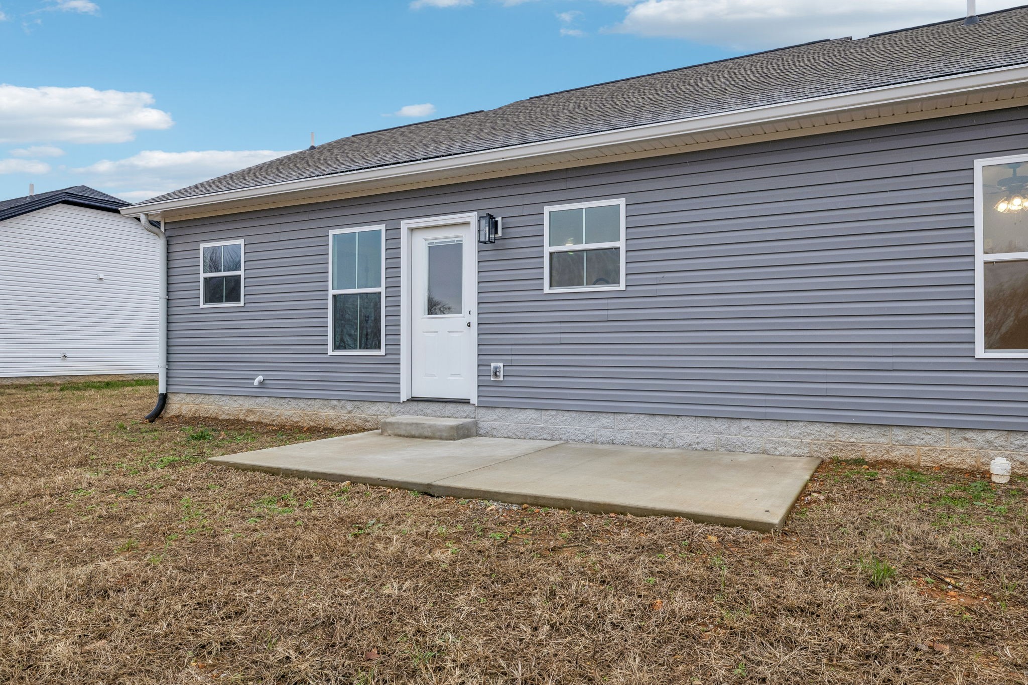 1073 Landing Lane Adams, TN 37010 - Photo 22 of 28 a view of a house with a yard