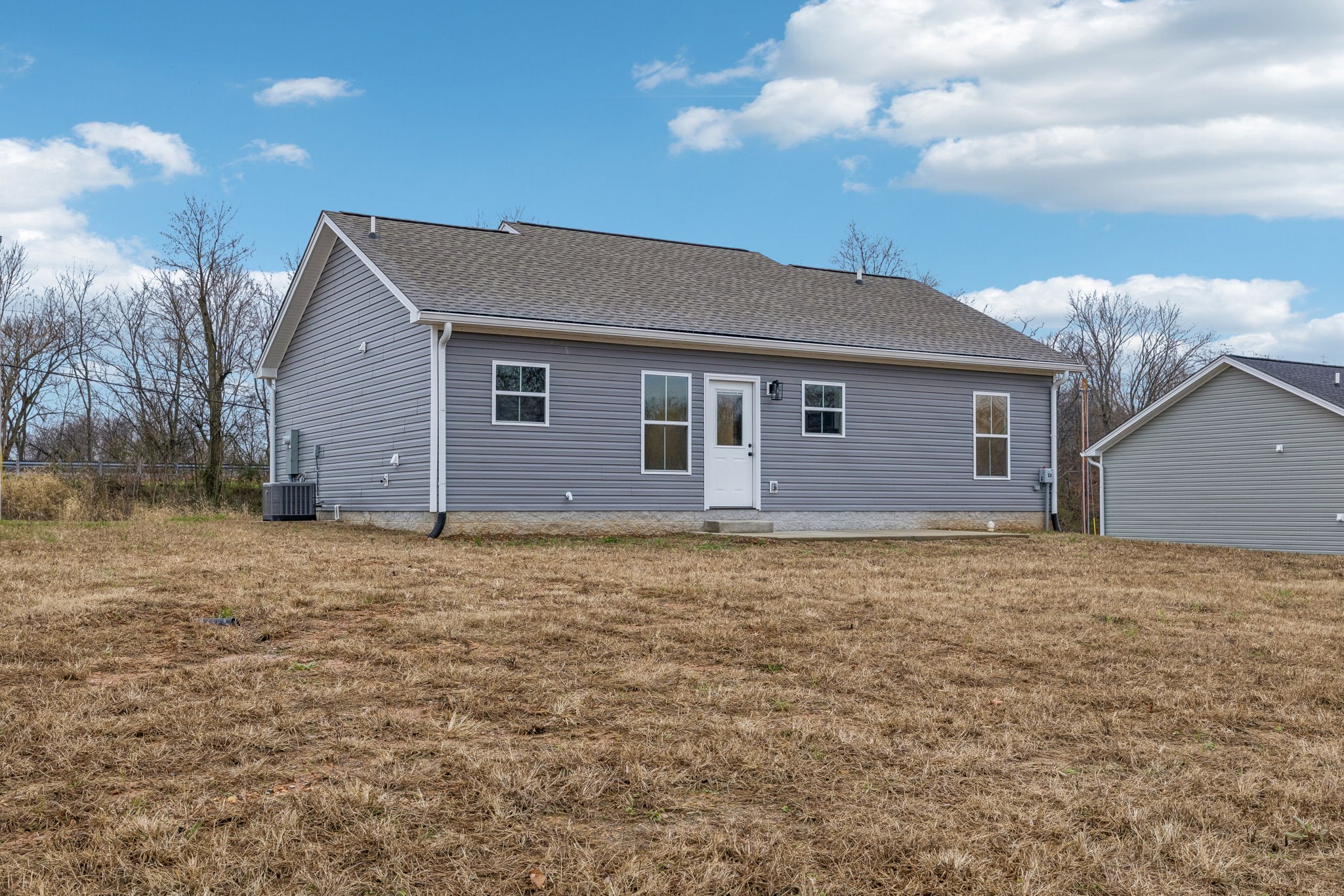 1073 Landing Lane Adams, TN 37010 - Photo 27 of 28 a backyard of a house
