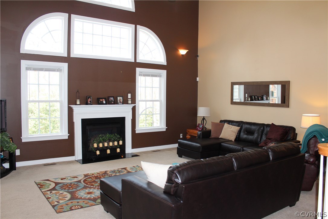 11848 Club Ridge Drive Chester, VA 23836 - Photo 8 of 35 The two-story family room is spacious and features
