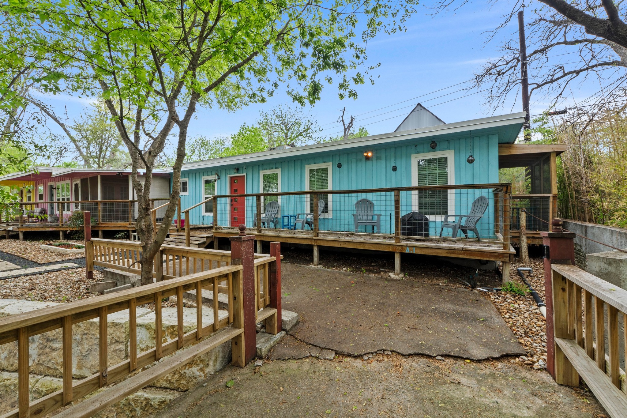 4512 Speedway, Unit A Austin, TX 78751 - Photo 2 of 39 a backyard of a house with barbeque oven and outdoor seating