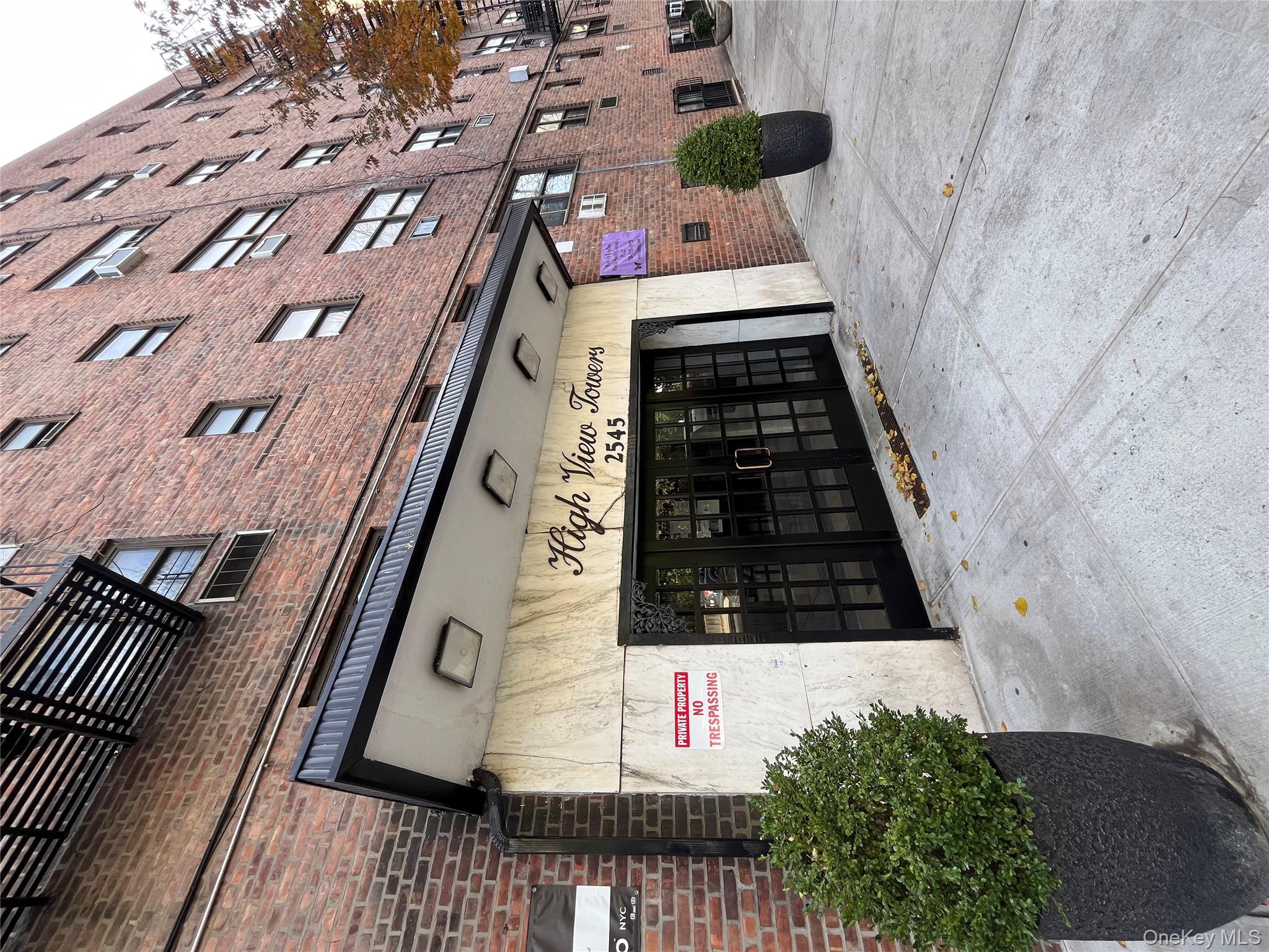 a view of a building with a garage